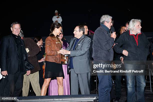 Actor Francis Huster, Anne Sophie Pochat, director Robert Hossein, director Claude Lelouch and singer Pierre barouh on stage at the end of the...