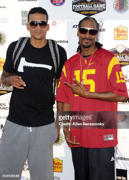 Player Matt Barnes and rapper Snoop Dogg attend the 2nd Annual Celebrity Flag Football Game benefiting Athletes VS. Cancer at Granada Hills Charter...
