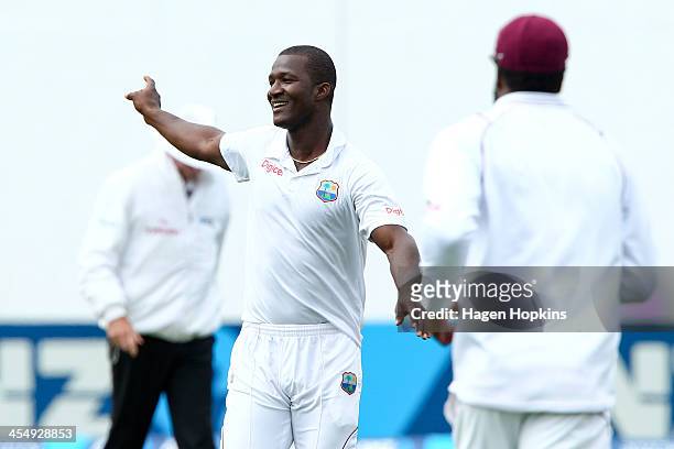 Darren Sammy of the West Indies celebrates after taking the wicket of Peter Fulton of New Zealand during day one of the Second Test match between New...