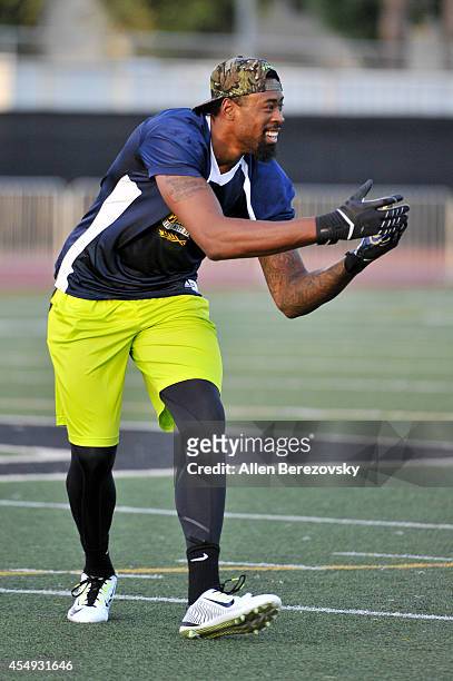 Player DeAndre Jordan waits for a catch during the 2nd Annual Celebrity Flag Football Game benefiting Athletes VS. Cancer at Granada Hills Charter...