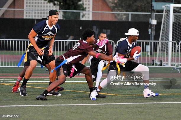 Players Chris Paul and Blake Griffin participate in the 2nd Annual Celebrity Flag Football Game benefiting Athletes VS. Cancer at Granada Hills...