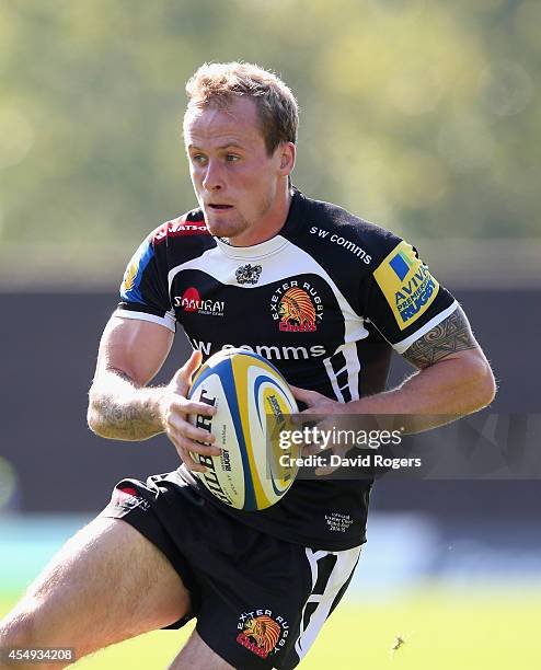 Jack Arnott of Exeter Chiefs runs with the ball during the Aviva Premiership match between London Welsh and Exeter Chiefs at the Kassam Stadium on...