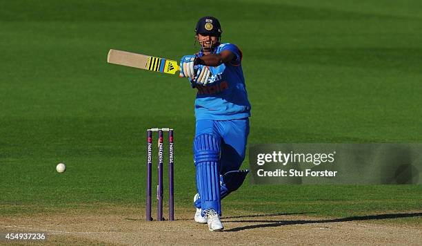 India batsman Suresh Raina hits out during the NatWest T20 International between England and India at Edgbaston on September 7, 2014 in Birmingham,...