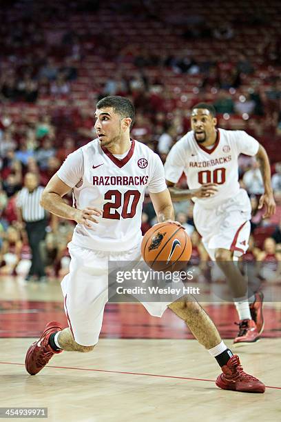 Kikko Haydar of the Arkansas Razorbacks dribbles the ball against the SE Louisiana Lions at Bud Walton Arena on December 3, 2013 in Fayetteville,...