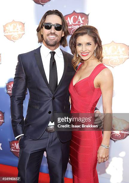Recording artist Jake Owen and Lacey Buchanan arrive at the American Country Awards 2013 at the Mandalay Bay Events Center on December 10, 2013 in...