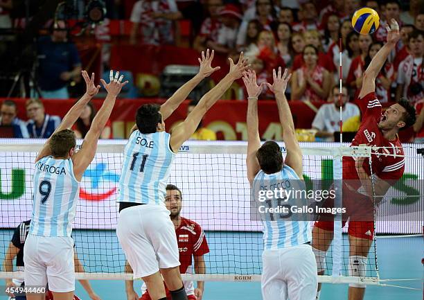 Polish team in action during the FIVB Volleyball Mens World Championship match between Poland and Argentina at Hala Stulecia on September 07, 2014 in...