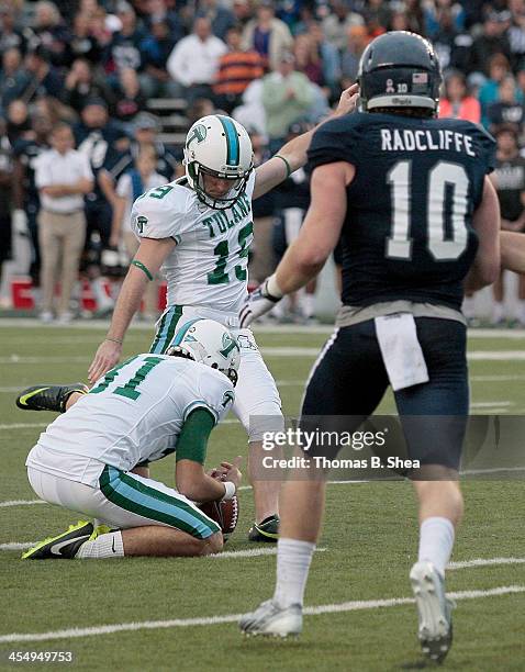 Marc Edwards of the Tulane Green Wave kicks against the Rice Owls on November 30, 2013 at Rice Stadium in Houston, Texas.Rice won 17 to 13.