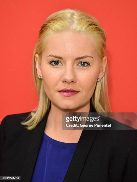 Actress Elisha Cuthbert makes an in-store Holiday appearance at Target at Shoppers World Danforth on December 10, 2013 in Toronto, Canada.