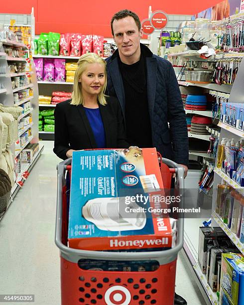 Actress Elisha Cuthbert and her husband professional hockey player Dion Phaneuf make an in-store Holiday appearance at Target at Shoppers World...