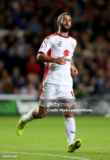 Will Grigg of MK Dons at Stadium mk on August 26, 2014 in Milton Keynes, England.