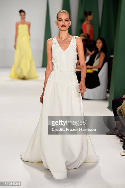 Model Daphne Groeneveld walks the runway at the Carolina Herrera fashion show during Mercedes-Benz Fashion Week Spring 2015 at The Theatre at Lincoln...