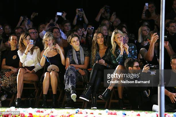 Alexa Chung, Tali Lennox, Amber LeBon, and Alexandra Richards attend Tommy Hilfiger Women's fashion show during Mercedes-Benz Fashion Week Spring...