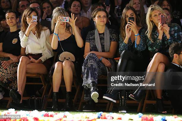 Alexa Chung, Tali Lennox, Amber LeBon, and Alexandra Richards attend Tommy Hilfiger Women's fashion show during Mercedes-Benz Fashion Week Spring...