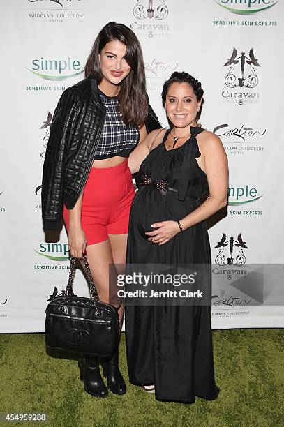Lily Lane and Stacy Igel of Boy Meets Girl attends the Simple Skincare & Caravan Stylist Studio Fashion Week Event on September 7, 2014 in New York...