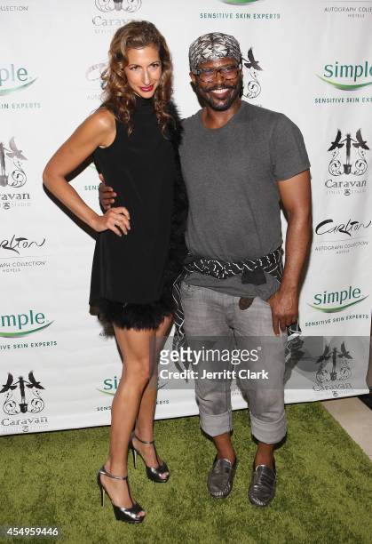 Alysia Reiner and Byron Lars attends the Simple Skincare & Caravan Stylist Studio Fashion Week Event on September 7, 2014 in New York City.