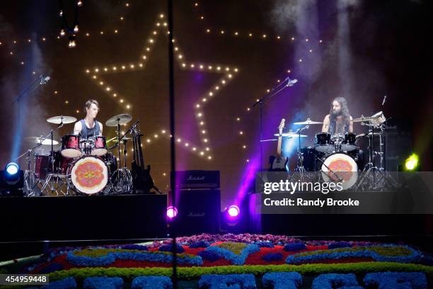 Drummers Tara Ferry and Steve Hash perform at Tommy Hilfiger Women's fashion show during Mercedes-Benz Fashion Week Spring 2015 at Park Avenue Armory...