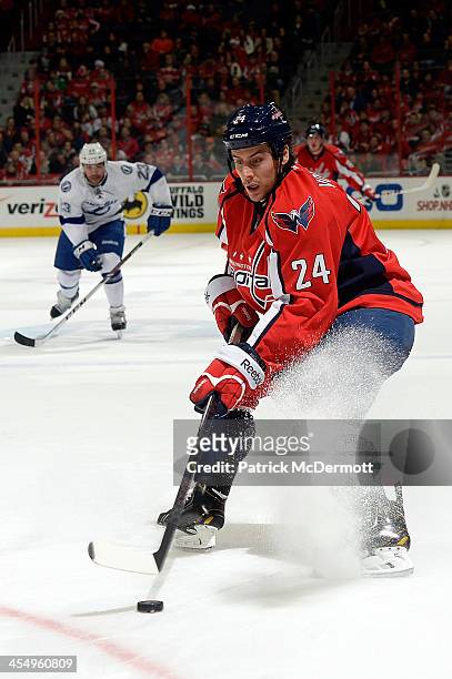 Aaron Volpatti of the Washington Capitals controls the puck in the second period during an NHL game against the Tampa Bay Lightning at Verizon Center...
