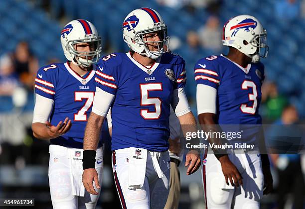 Quarterbacks Jeff Tuel, Jordan Palmer and EJ Manuel of the Buffalo Bills warmup prior to a preseason game against the Detroit Lions at Ralph Wilson...