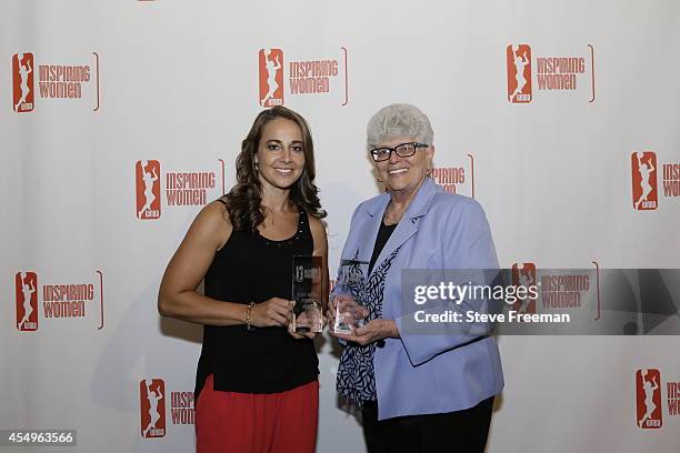 Former WNBA All Star Becky Hammon and WNBA Indiana Fever Head Coach Lin Dunn receive the Boost Mobile Pioneer Award during the Inspiring Women...