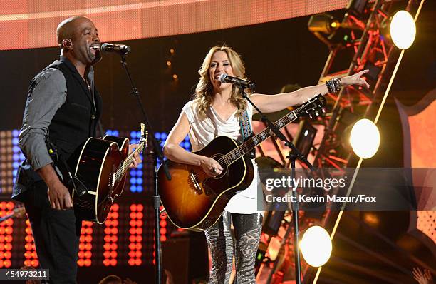 Singers Darius Rucker and Sheryl Crow perform onstage during the American Country Awards 2013 at the Mandalay Bay Events Center on December 10, 2013...