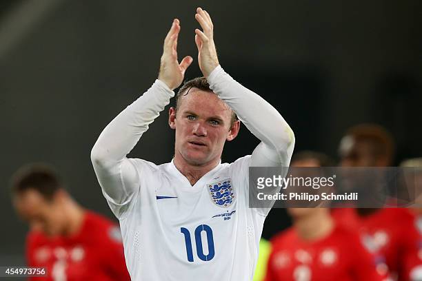 Wayne Rooney of England applauds the fans after the EURO 2016 Qualifier match between Switzerland and England on September 8, 2014 in Basel,...
