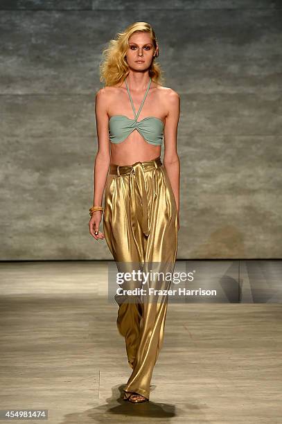 Model walks the runway at the Georgine fashion show during Mercedes-Benz Fashion Week Spring 2015 at The Pavilion at Lincoln Center on September 8,...