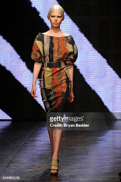 Model walks the runway at the Donna Karan New York 30th Anniversary fashion show during Mercedes-Benz Fashion Week Spring 2015 on September 8, 2014...