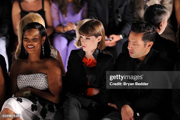 Garcelle Beauvais, model Coco Rocha and husband James Conran attend the Dennis Basso fashion show during Mercedes-Benz Fashion Week Spring 2015 at...