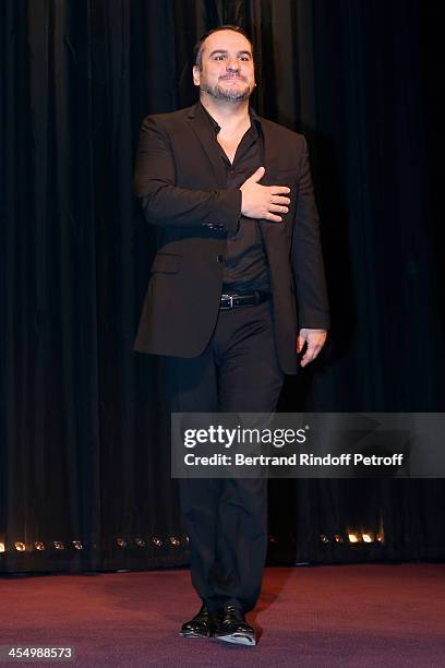 François-Xavier Demaison performs in his show, 'Demaison S'Evade...' Premiere at Theatre Edouard VII on December 10, 2013 in Paris, France.