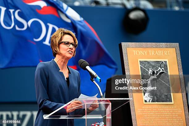 Mary Carillo speaks during a ceremony honoring Tony Trabert on Day fifteen of the 2014 US Open at the USTA Billie Jean King National Tennis Center on...