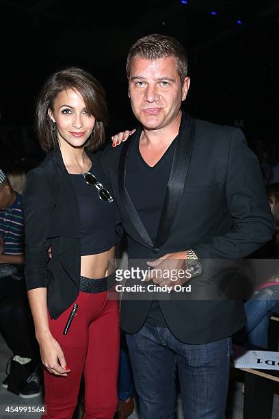 Kaitlin Monte and Tom Murro attend the Libertine fashion show during Mercedes-Benz Fashion Week Spring 2015 at The Pavilion at Lincoln Center on...