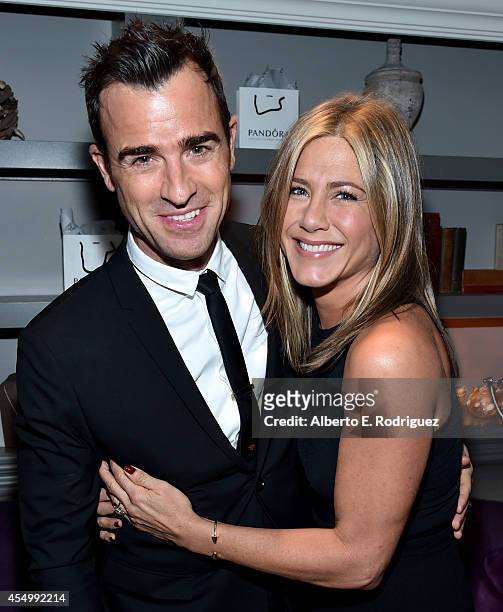 Actor Justin Theroux and actress/executive producer Jennifer Aniston attend the "Cake" cocktail reception presented by PANDORA Jewelry at West Bar on...