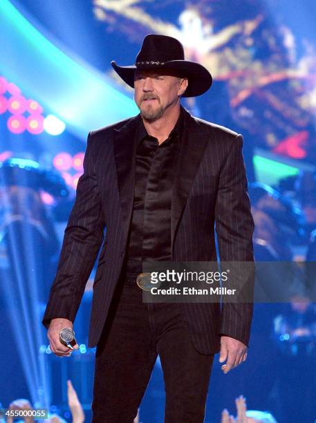 Co-host Trace Adkins performs onstage during the American Country Awards 2013 at the Mandalay Bay Events Center on December 10, 2013 in Las Vegas,...