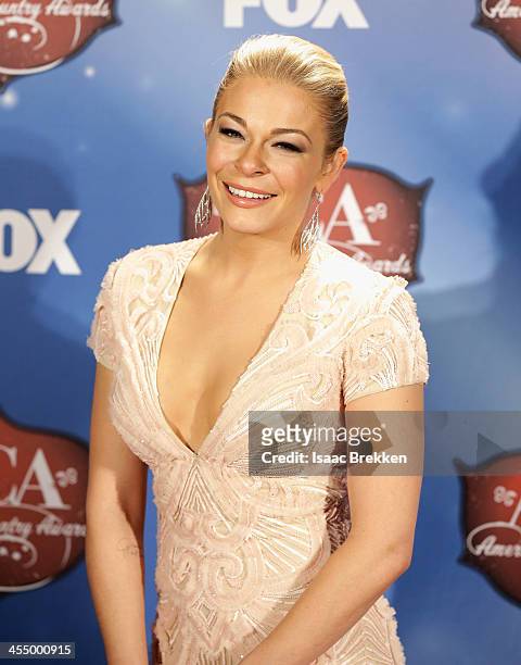 Recording artist LeAnn Rimes poses in the press room during the American Country Awards 2013 at the Mandalay Bay Events Center on December 10, 2013...