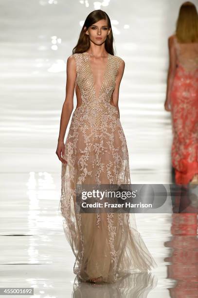 Model walks the runway at the Reem Acra fashion show during Mercedes-Benz Fashion Week Spring 2015 at The Salon at Lincoln Center on September 8,...