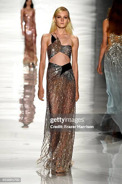 Model walks the runway at the Reem Acra fashion show during Mercedes-Benz Fashion Week Spring 2015 at The Salon at Lincoln Center on September 8,...