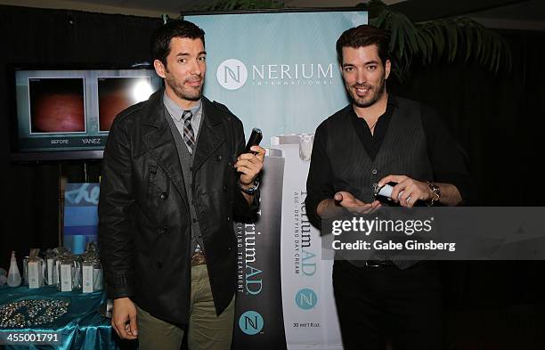Television personalities Drew Scott and his brother Jonathan Scott arrive at Nerium International at the American Country Awards at the Mandalay Bay...