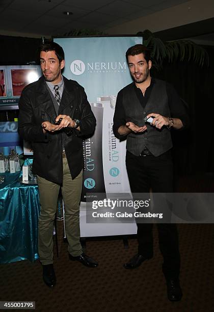 Television personalities Drew Scott and his brother Jonathan Scott arrive at Nerium International at the American Country Awards at the Mandalay Bay...