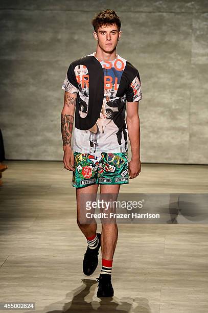 Model walks the runway at the Libertine fashion show during Mercedes-Benz Fashion Week Spring 2015 at The Pavilion at Lincoln Center on September 8,...