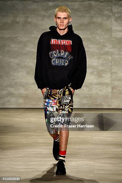 Model walks the runway at the Libertine fashion show during Mercedes-Benz Fashion Week Spring 2015 at The Pavilion at Lincoln Center on September 8,...