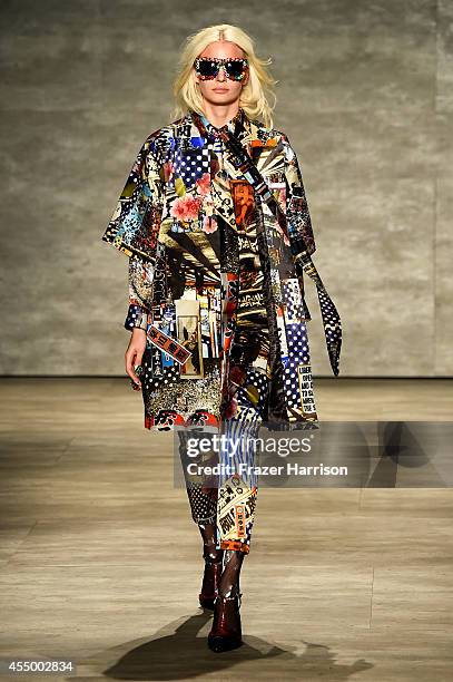 Model walks the runway at the Libertine fashion show during Mercedes-Benz Fashion Week Spring 2015 at The Pavilion at Lincoln Center on September 8,...