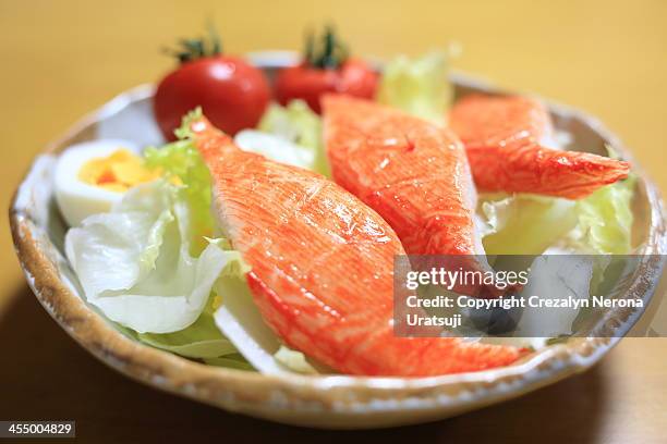 kani kama salad (crab sticks) - crab stick stock pictures, royalty-free photos & images