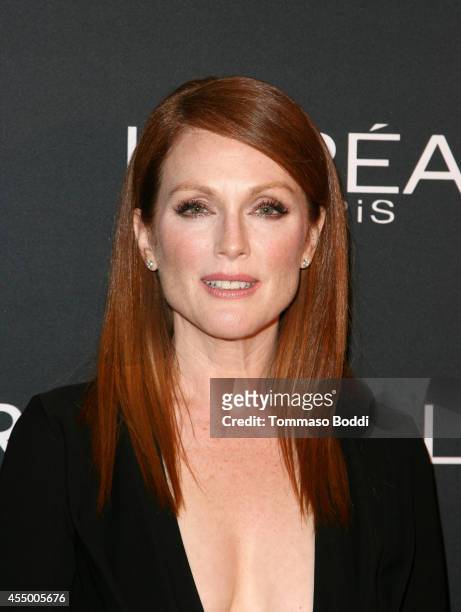 Actress Juliane Moore prepares with L'Oreal for the "Still Alice" Premiere during the 2014 Toronto International Film Festival at the Shangri-La...
