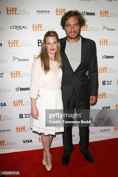 TORONTO, ON Actors Kate Arrington and Michael Shannon attend the "99 Homes" premiere during the 2014 Toronto International Film Festival at Princess...