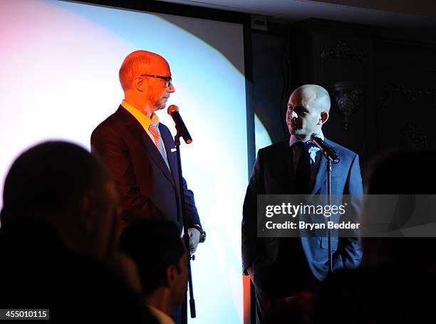 Screenwriter and Artists for Peach and Justice Founder Paul Haggis and CEO of Artists for Peace and Justice David Belle speak onstage at Artists for...