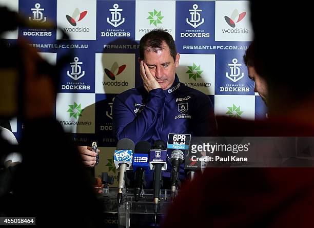 Dockers coach Ross Lyon waits for the start of his media session before a Fremantle Dockers AFL training session at Fremantle Oval on September 9,...