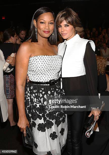 Garcelle Beauvais and Lisa Rinna attend Dennis Basso during Mercedes-Benz Fashion Week Spring 2015 at The Theatre at Lincoln Center on September 8,...