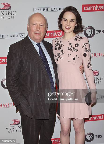 Actor Julian Fellowes and actress Michelle Dockery attend "Downton Abbey" Season Four cast photo call at Millenium Hotel on December 10, 2013 in New...