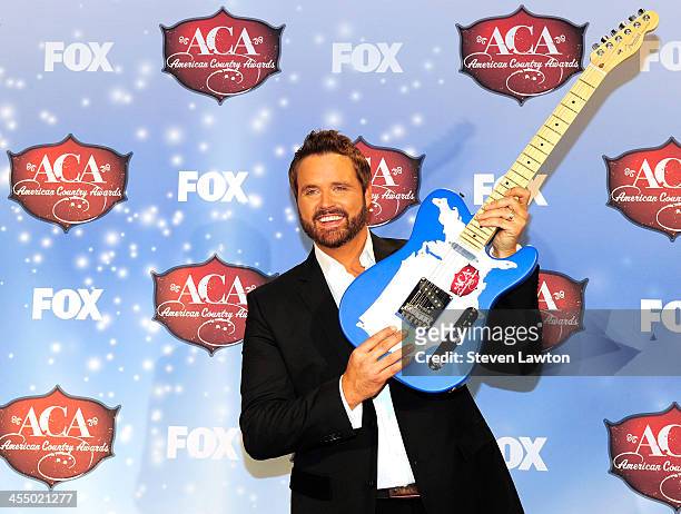 Singer Randy Houser poses in th press room during the American Country Awards 2013 at the Mandalay Bay Events Center on December 10, 2013 in Las...