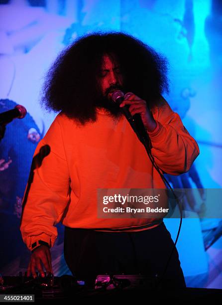 Comedian and Musician Reggie Watts performs onstage at Artists for Peace and Justice NYC Holiday Benefit presented by Bovet 1822 at Up&Down on...